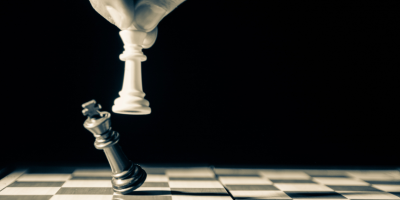 strategic life reduces stress - person playing chess
