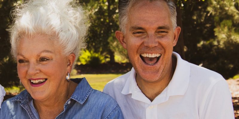 Optimal Health Quiz - older man and woman laughing