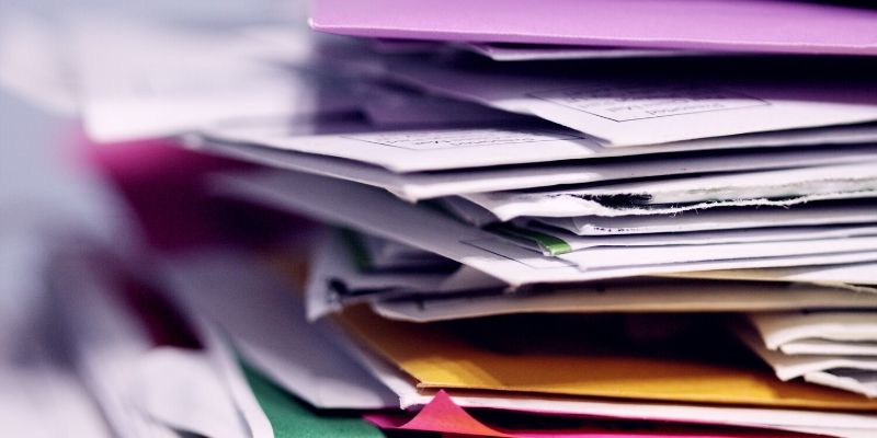Optimal Health Quiz - stack of messy papers