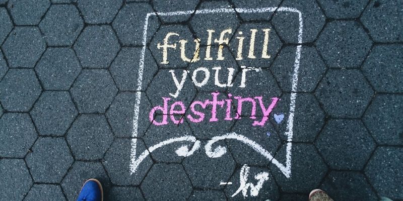 Optimal Health Quiz - words "fulfill your destiny" written on the pavement with chalk